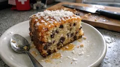 Saftige Kokos-Schoggi-Torte mit Schokogocce – mit schneller Honig-Kokos-Decke